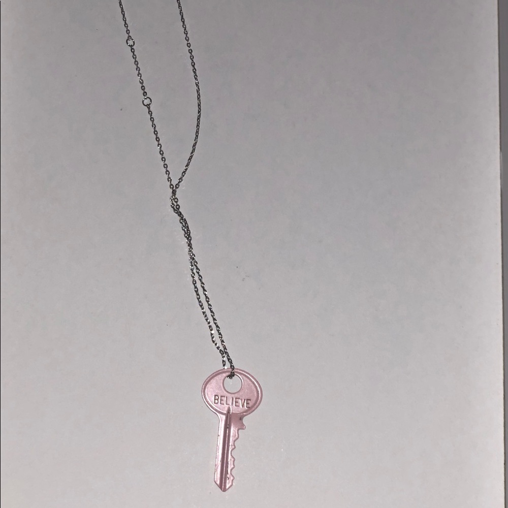 The Giving Keys pink ‘Believe’ necklace